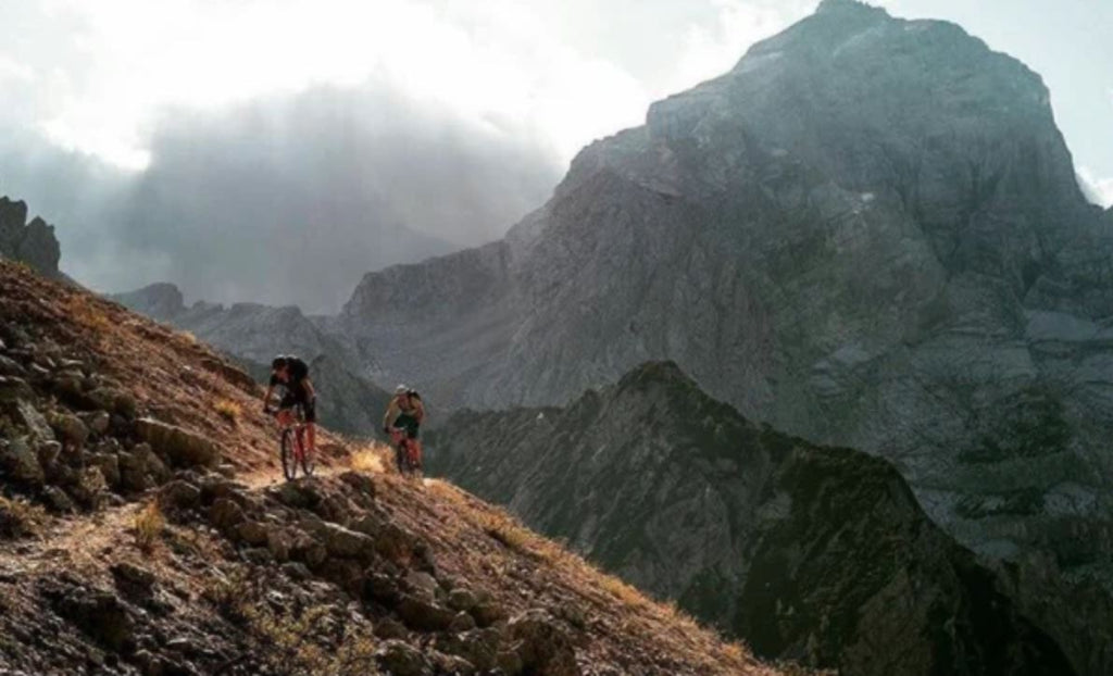 Two cyclists in the mountains