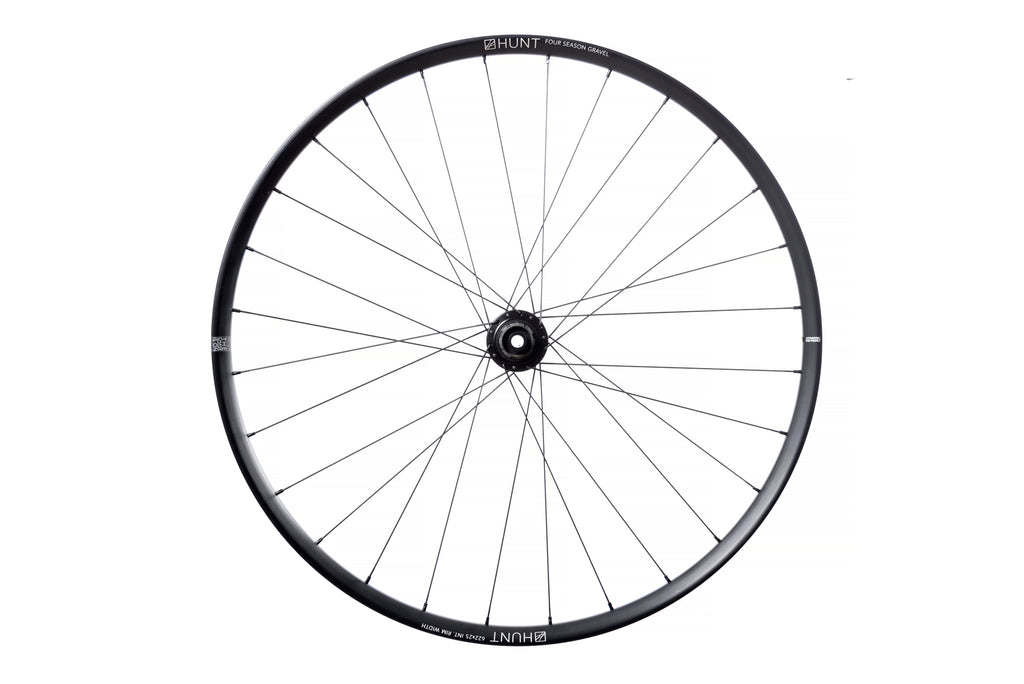<h1>Rims</h1><i>Strong and light 6066-T6 (+34% tensile strength vs 6061-T6) heat-treated rim features an asymmetric shape which is inverted from front to rear to provide balanced higher spoke tensions meaning your spokes stay tight for longer. The profile is disc-specific, allowing higher-strength to weight as no reinforcement is required for a braking surface. The extra wide rim at 29mm (25mm int) creates a great tyre profile with wider 35c+ tires, giving excellent grip and lower rolling resistance.</i>