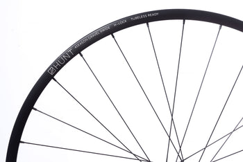 <h1>Spokes</h1><i>We chose the top-of-the-range Pillar Spoke Re-enforcement PSR XTRA models. These butted blade aero spokes are lighter and provide a greater degree of elasticity to maintain tensions and add fatigue resistance. These PSR J-bend spokes feature the 2.2 width at the spoke head providing more material in this high stress area. The nipples come with a square head so you can achieve precise tensioning. Combining these components well is key, which is why all HUNT wheels are hand-built.</i>