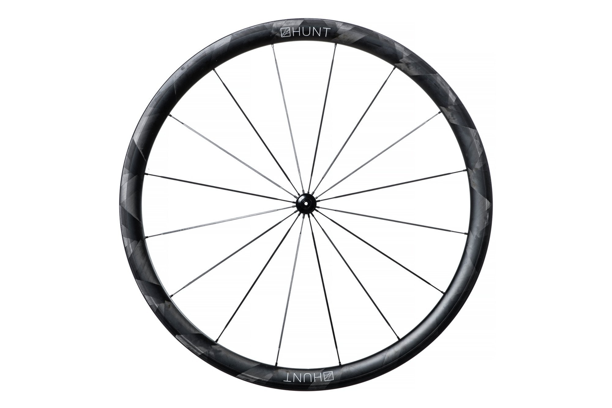 <h1>Rims</h1><i>Using an adaptive filament winding process, which varies thickness and orientation across the rim, these rims achieve a very light weight and excellent transmission of force from the spoke to the rest of the rim. The process also provides additional material to create high strength at the spoke areas while minimising unnecessary weight between the spokes. They are wide at 26mm (19mm int.) which creates a great tyre profile, resulting in excellent grip and lower rolling resistance.</i>