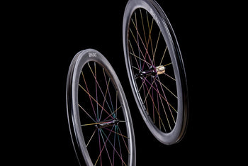<h1>Oil-Slick Spokes</h1><i>We can also give the spokes a Ti-Nitride coating which not only gives them an eye-catching oil slick rainbow look but also improves wear and corrosion resistance due to the super-hard micro hardness of this coating. The coating is multi-compounded by ceramics and transition metal, so the bonding force between coating and base is immensely improved. This results in a really long lasting finish.</i>