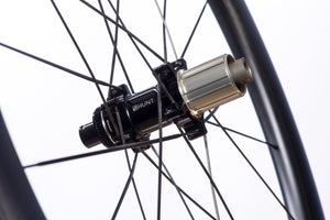 Freehub BodyFeaturing a 3 multi-point pawls with 3 teeth each and a 48 tooth ratchet ring results in an impressively low 7.5 degree engagement angle and excellent resistance to wear under heavy loads. The Sprint freehub has strong individual pawl springs which engage quicker. There is also a Steel Spline Insert re-enforcement to provide excellent durability against cassette sprocket damage often seen on standard alloy freehub bodies.