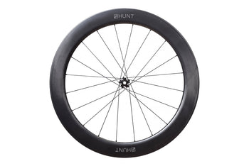 <h1>Rims</h1><i>A strong and super-lightweight rim featuring unidirectional T24/30 carbon fibre with 3K weave re-enforced spoke holes. The wide aero profile delivers excellent handling and speed. The evolution of disc brake specific construction has allowed massive weight savings over equivalent rim-brake rims. The removal of braking forces on the rim allows a strong but very light rim to be designed that can focus on it's primary roles of supporting the tire and spoke forces.</i>