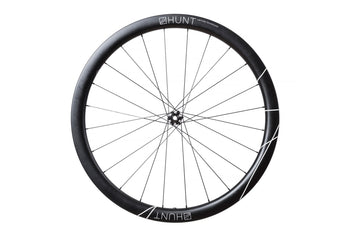 <h1>Patented Limitless Technology</h1><i>In order to create the most aerodynamic & stable shape for the tire, a rim bed of 24.5mm is needed. With the tire profile this creates, the ideal shape of the rim curves out to an external width of 36mm. To overcome the weight penalty associated with this, we use a (non-structural) low density expanding polymer insert, inside a channel carved out during pre-preg.</i>
