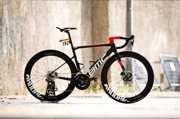 <h1>Ride Tour Ridden Wheels</h1><i>The limited edition wheels being sold will be ridden by Team Qhubeka NextHash on the final stage of the Tour De France, rolling into Paris on Sunday 18th July, coinciding with Mandela Day.</i>